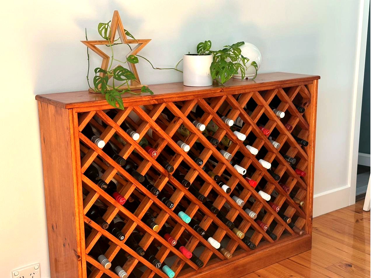 Pine wine rack with diagonal lattice, stain and varnish finish