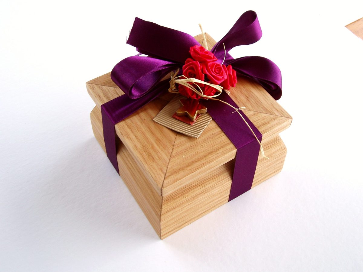 Oak gift box with mitre lid — presented with purple ribbon and roses